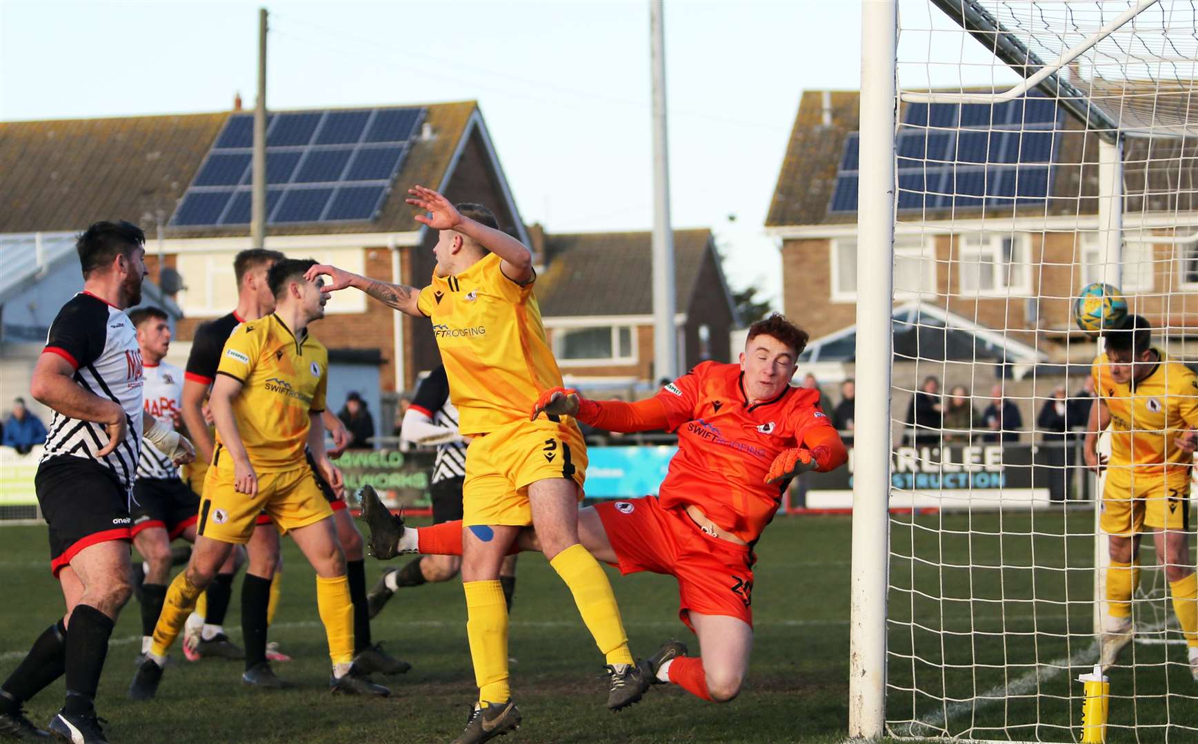 Bearsted's Adam Turston fails to keep out Jack Penny's corner kick that opened the scoring for Deal Town in their 2-0 weekend win. Picture: Paul Willmott