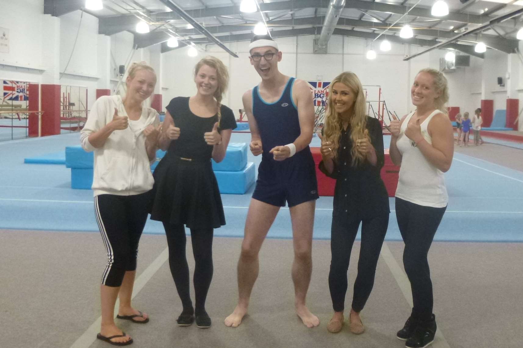 CBBC’s Officially Amazing presenter Ben Shires (centre) with staff from the NDGA