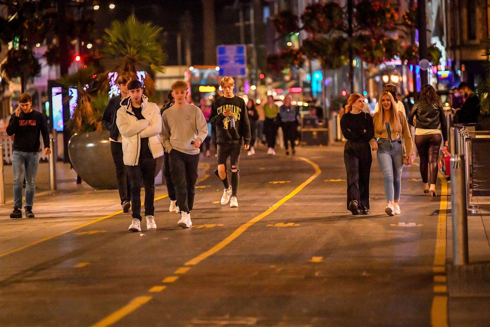 People walk through Cardiff city centre (Ben Birchall/PA)