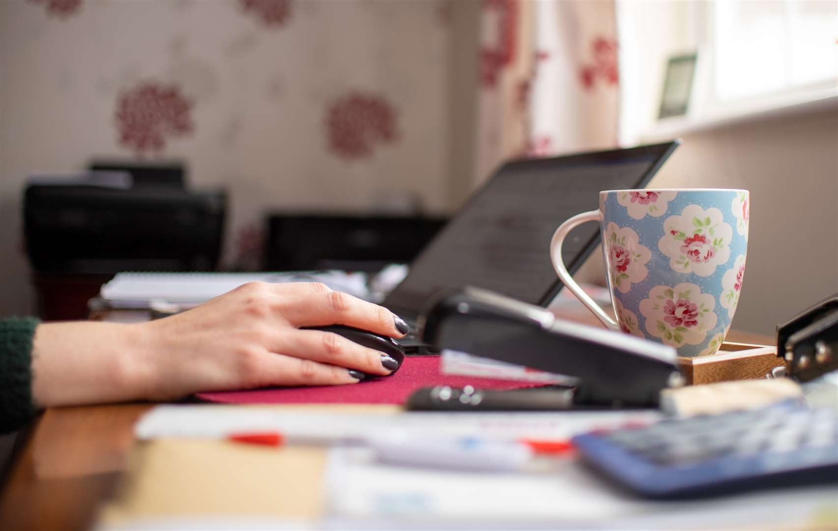 Britons are getting used to working from home (Joe Giddens/PA)