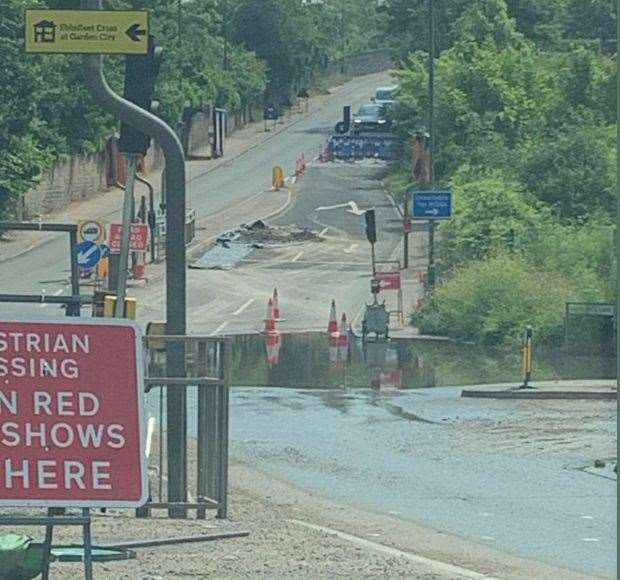 A massive puddle at the junction of Manor Way, Craylands Lane and London Road in Swanscombe