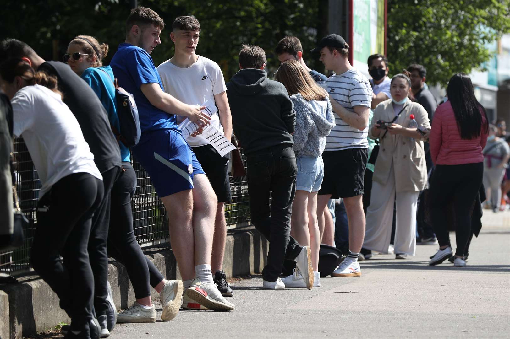 People queuing to go into Belmont Health Centre in Harrow (Jonathan Brady/PA)