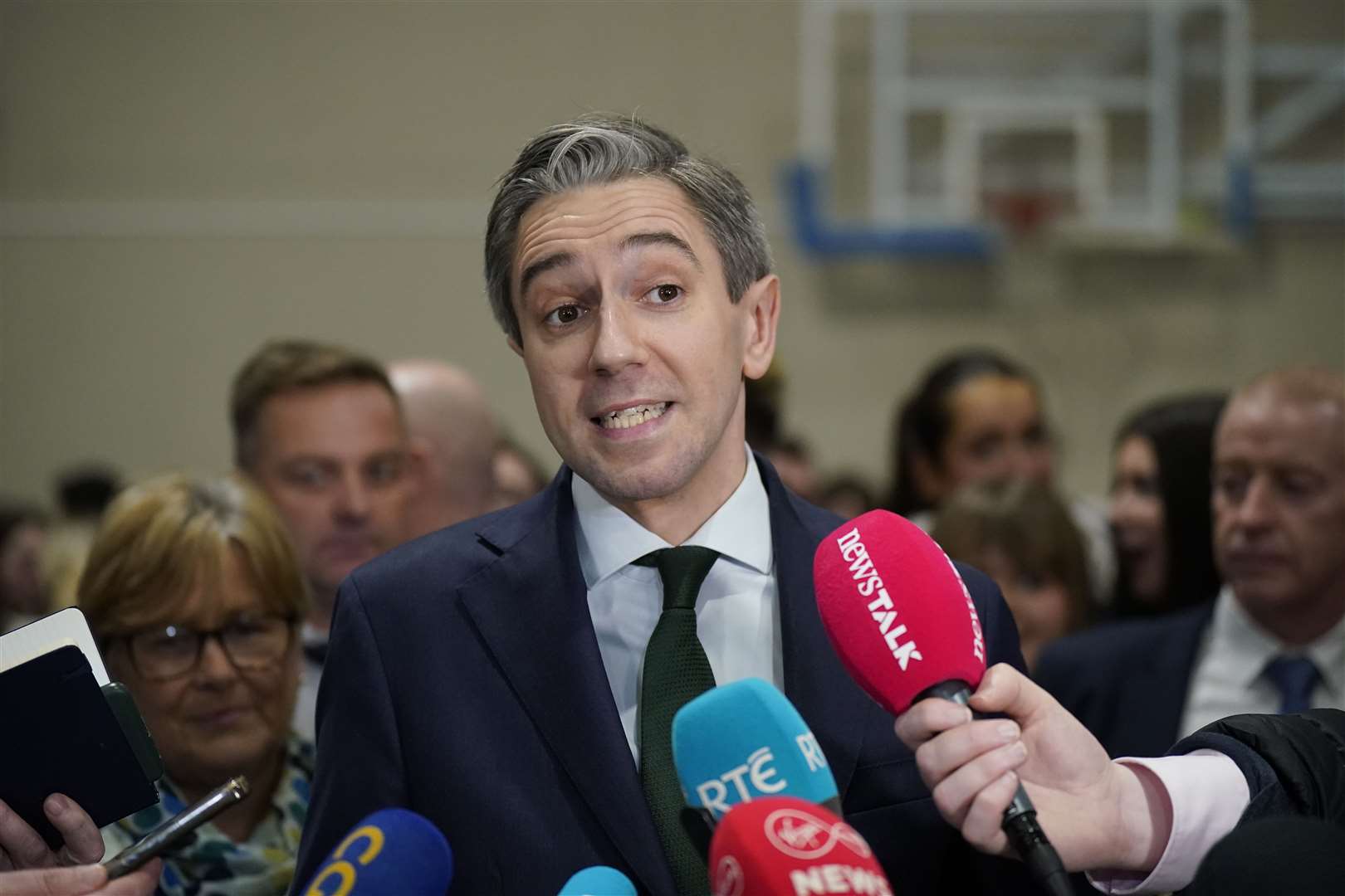 Taoiseach and Fine Gael leader Simon Harris speaks to the media as he arrives at the election count centre at Shoreline Leisure Greystones in Co Wicklow (Niall Carson/PA)