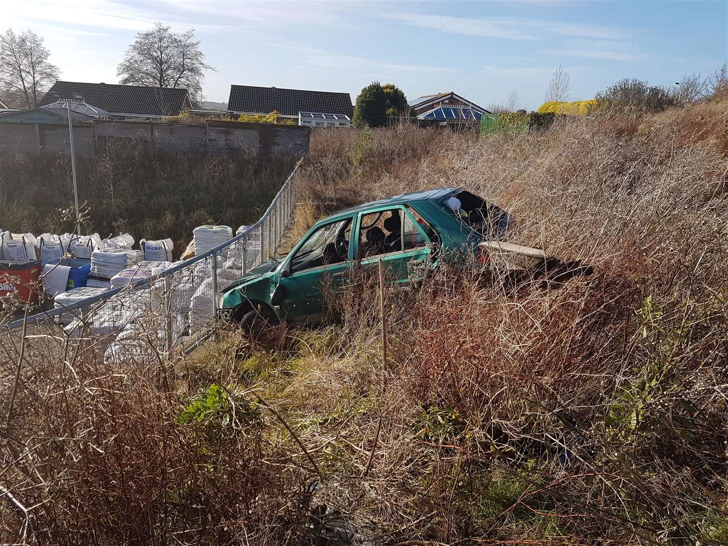 Peugeot 106 metres from Wickes' yard