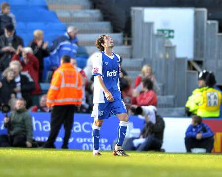 John Nutter looks to the heavens in despair after his own goal against Charlton