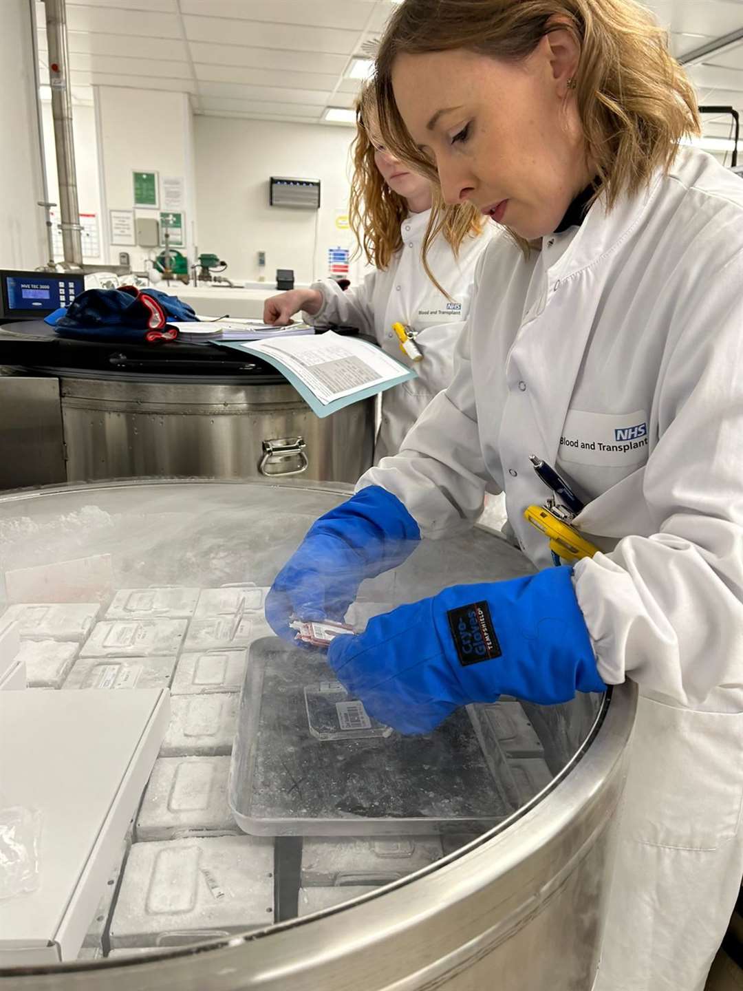 Staff from NHS Blood and Transplant getting the frozen cord stem cells out of storage at NHSBT Filton before Christmas 2023 in preparation for Gunner’s transplant (NHSBT/PA)