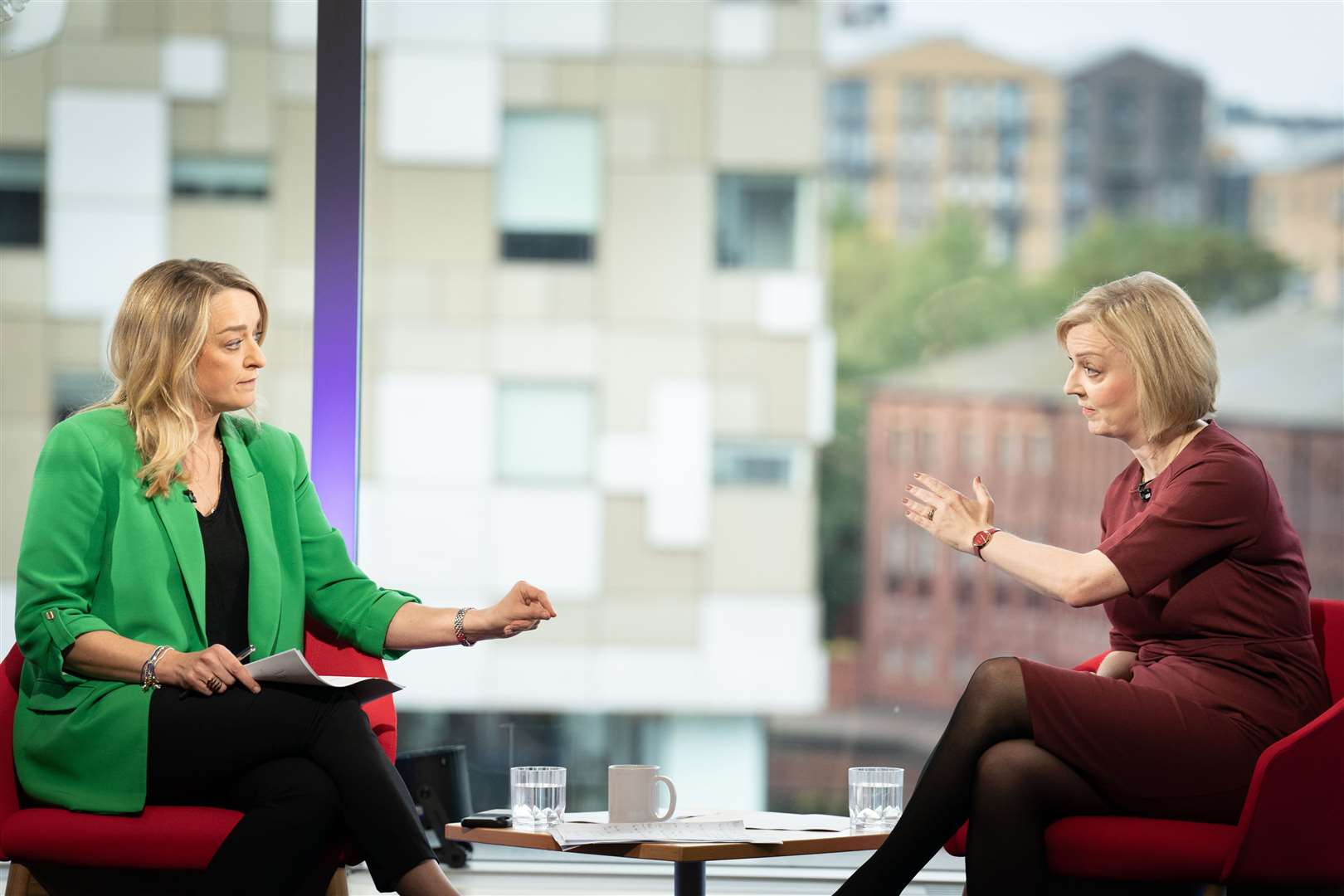 Liz Truss, right, told Laura Kuenssberg she ‘stood by the package’ the Government had announced (Stefan Rousseau/PA)