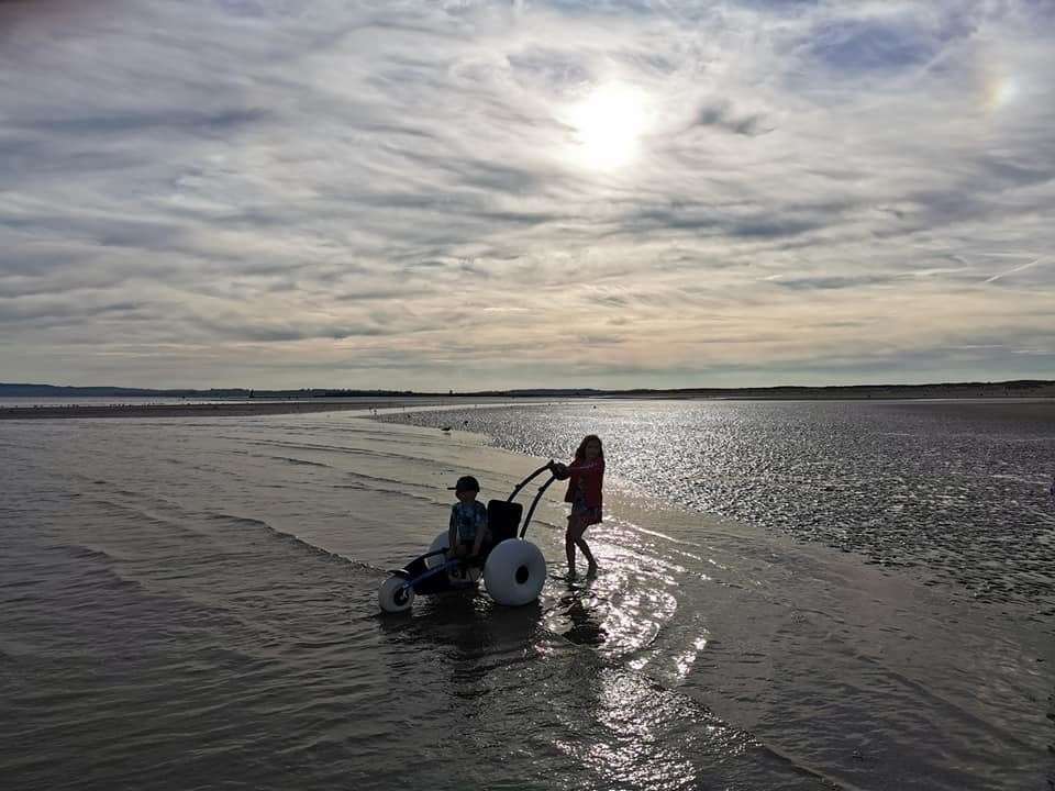 Tony Hudgell on his all-terrain wheelchair at Camber Sands (12339655)