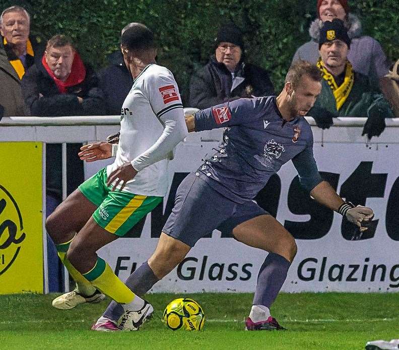 Folkestone goalkeeper Jonny Henry tries his luck at the death against Dover - as a winger! Picture: Helen Cooper