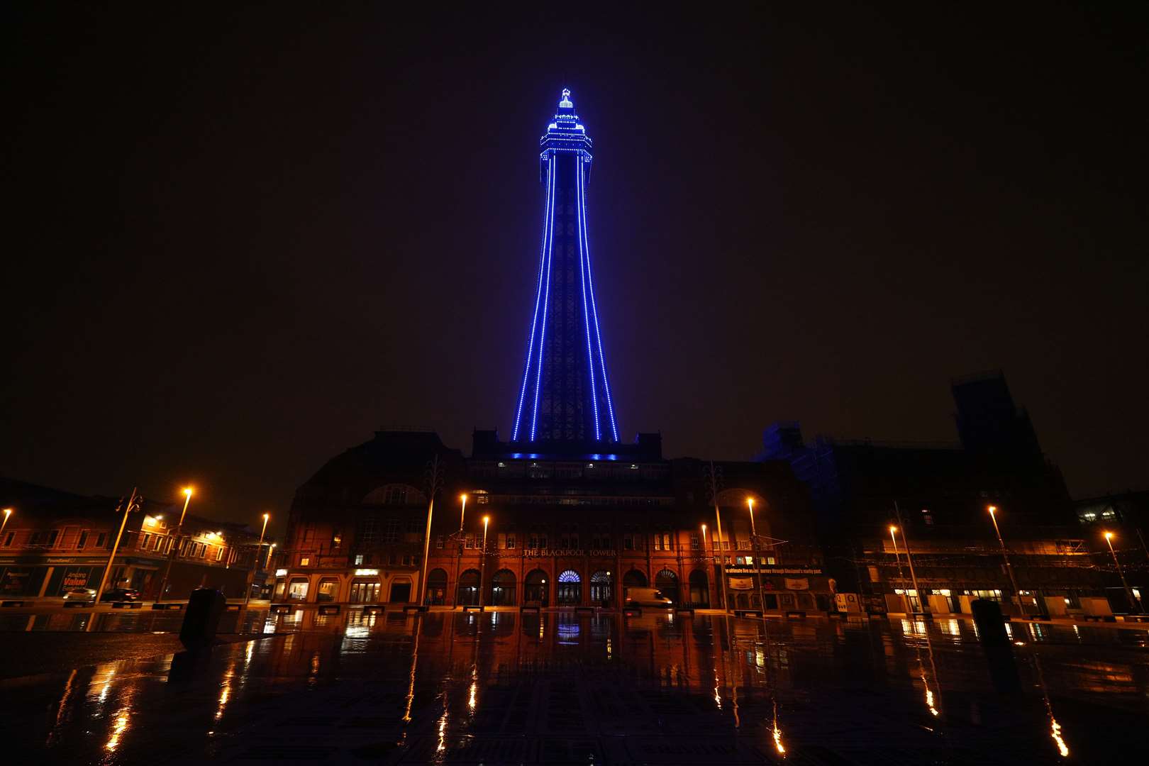 Blackpool Tower is lit up in blue following the death of Sir Tom (Peter Byrne/PA)