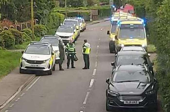 Several police cars and ambulances at the scene of the crash. Picture: John Dalton