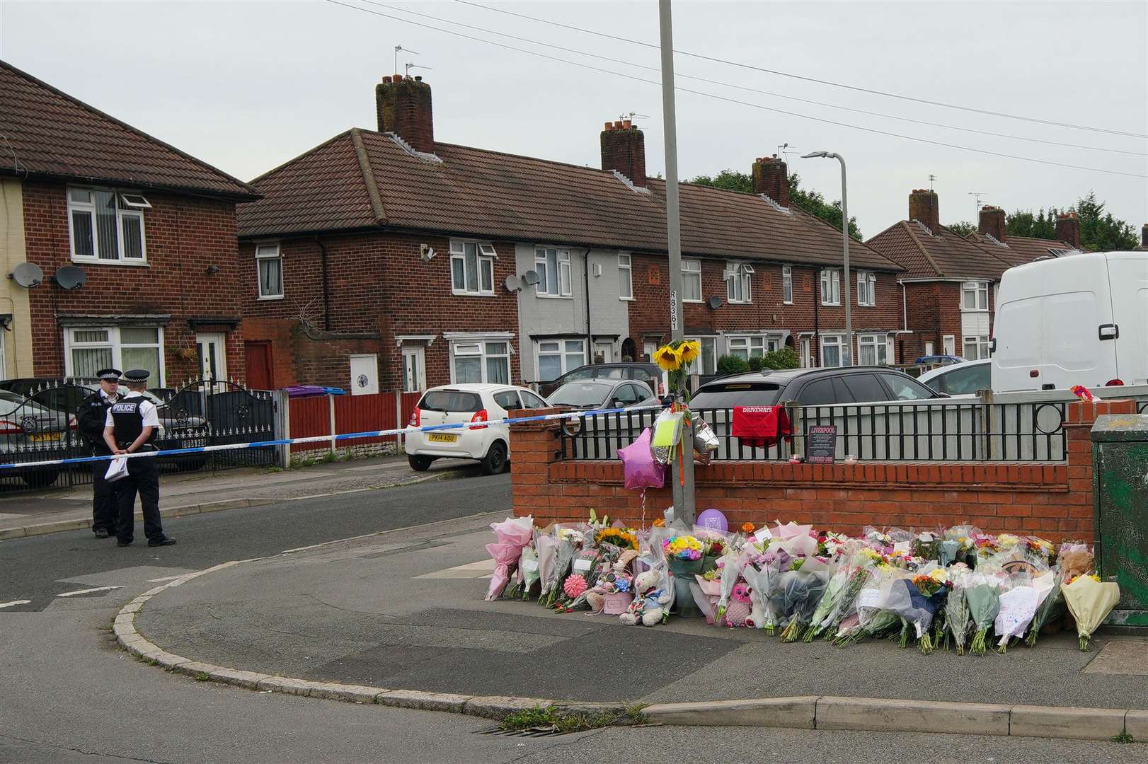 Flowers are left near the scene of Olivia’s murder in Kingsheath Avenue, Knotty Ash, Liverpool (Peter Byrne/PA)