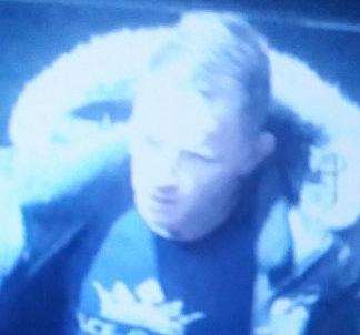 A CCTV still was released following reports of a suspect brandishing a weapon