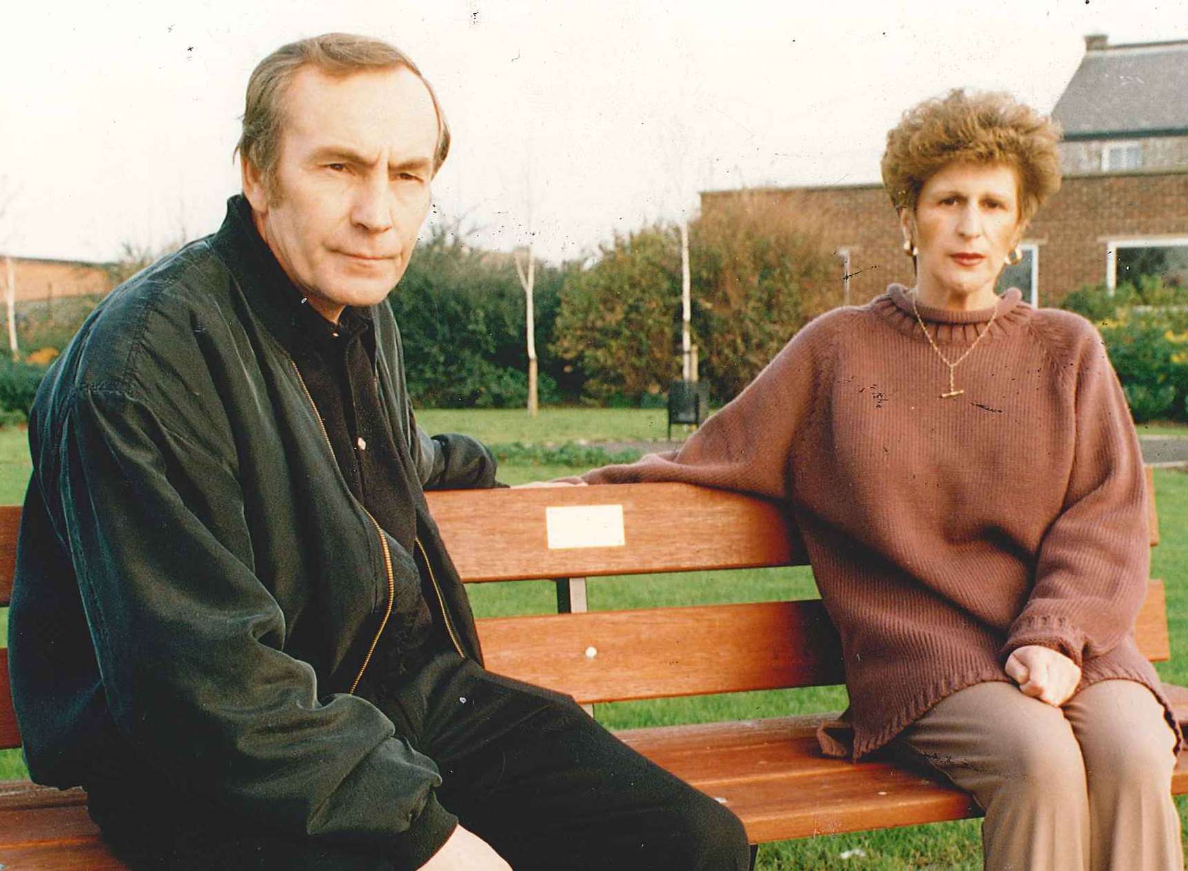 Cliff and Linda Tiltman at a bench in memory of their daughter