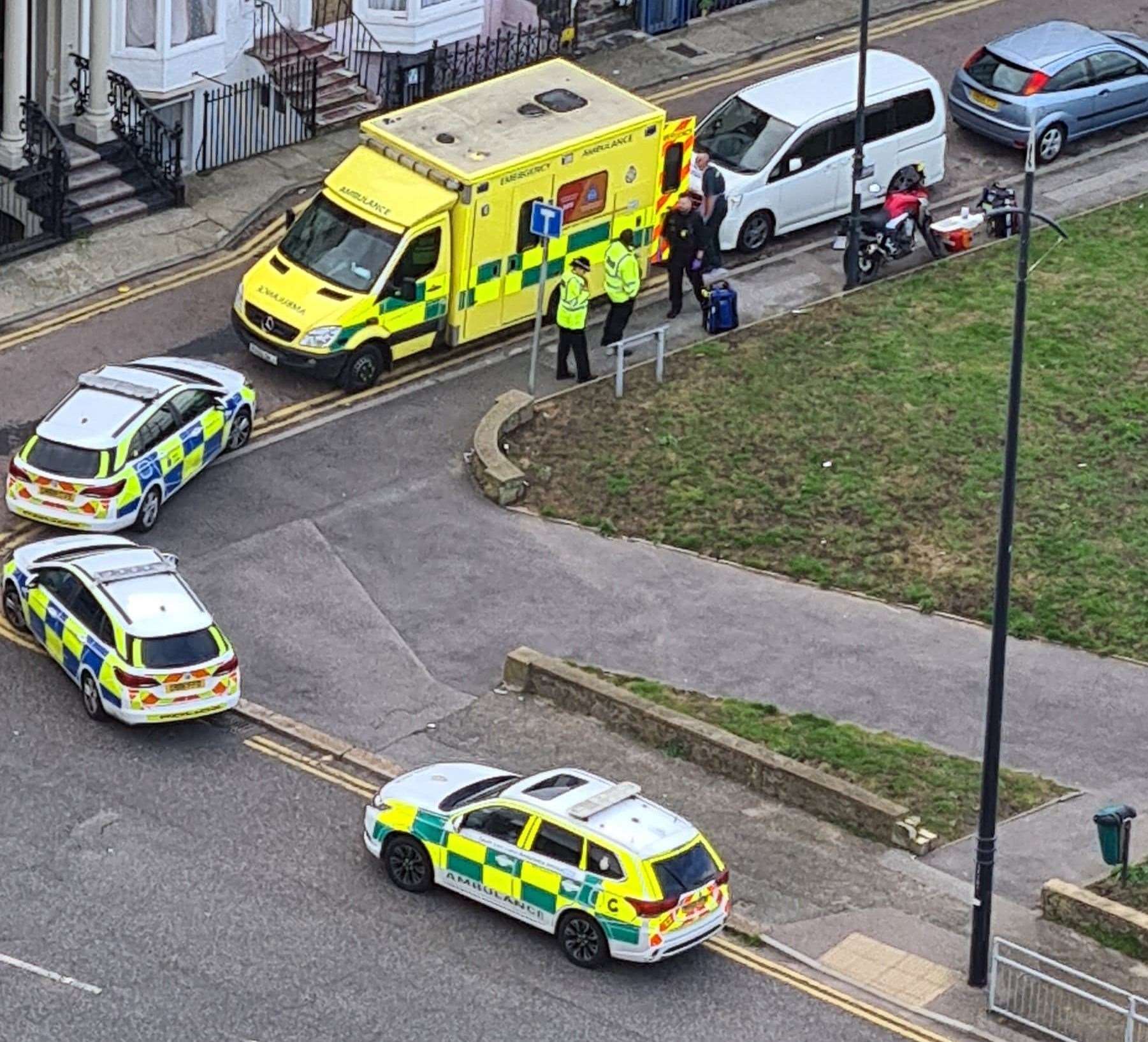 Two police cars and an ambulance parked on the corner of Buenos Ayres and Station Approach