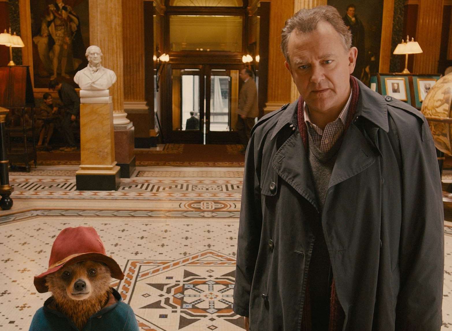 Hugh Bonneville and Paddington Bear in Paddington Credit: PA Photo/StudioCanal