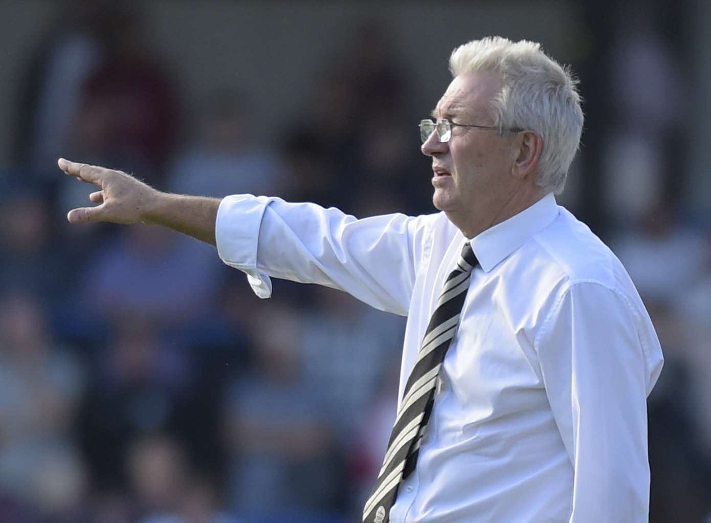 Chris Kinnear points the way against Lincoln. Picture: Tony Flashman.