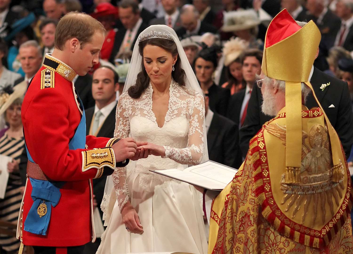 The Duke of Cambridge and Kate Middleton exchange rings in front of the Archbishop of Canterbury at Westminster Abbey in 2011 (Dominic Lipinski/PA)