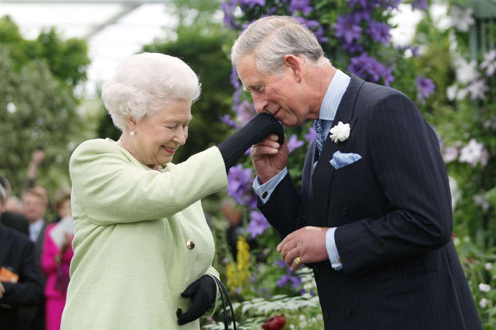 Charles, as the Prince of Wales, with his mother Queen Elizabeth II at the Chelsea Flower Show (Sang Tan/PA)