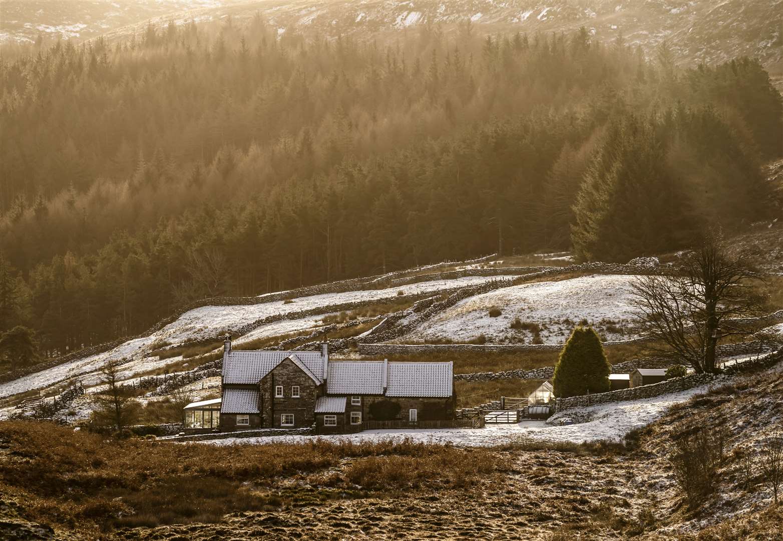 Frost and snow covers a house in the North York Moors National Park (Danny Lawson/PA)