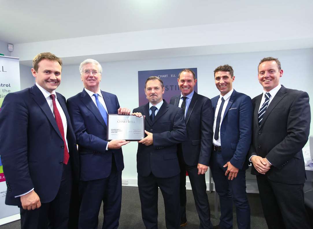 Tom Tugendhat and Michael Fallon with Chartwell staff at the opening of the new technology centre. Picture: Shiv Gohil/Chartwell