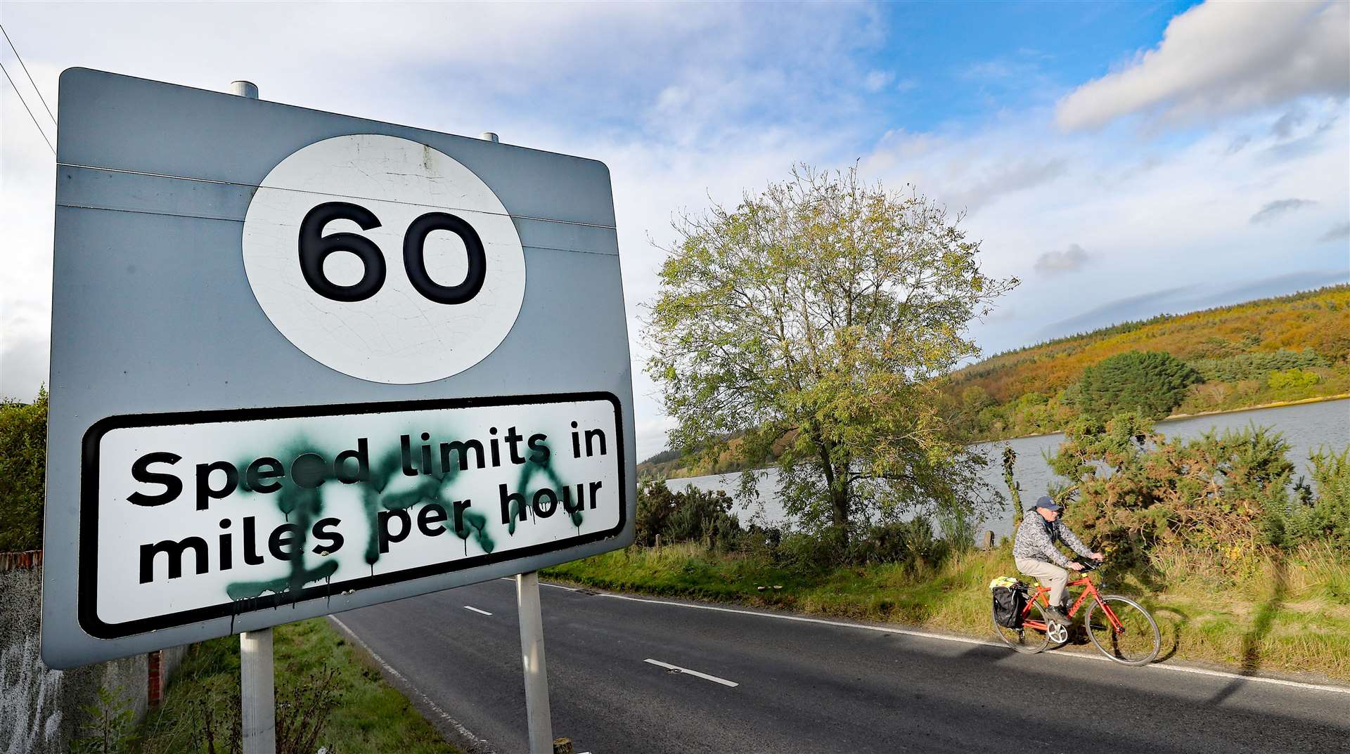 A cyclist crosses the border at Newry and Omeath in the Republic of Ireland (Niall Carson/PA)