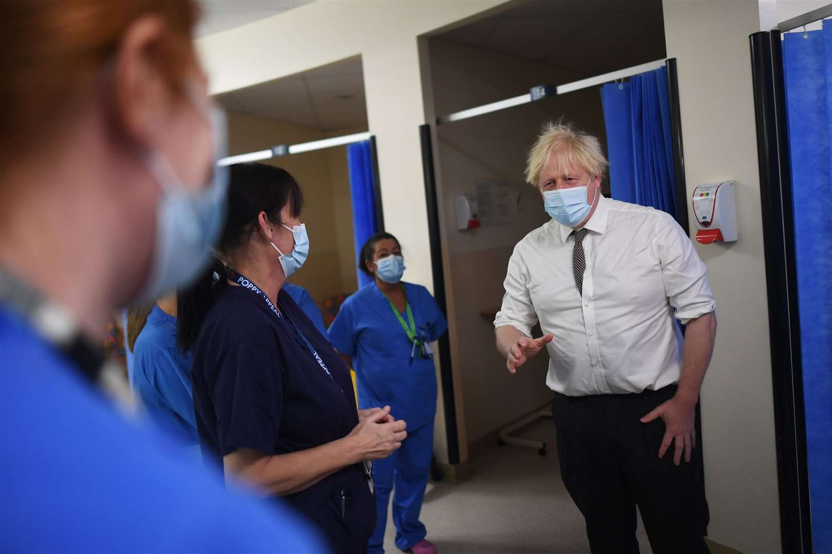 Boris Johnson was photographed with and without a face mask on during his hospital visit on Monday (Peter Summers/PA)