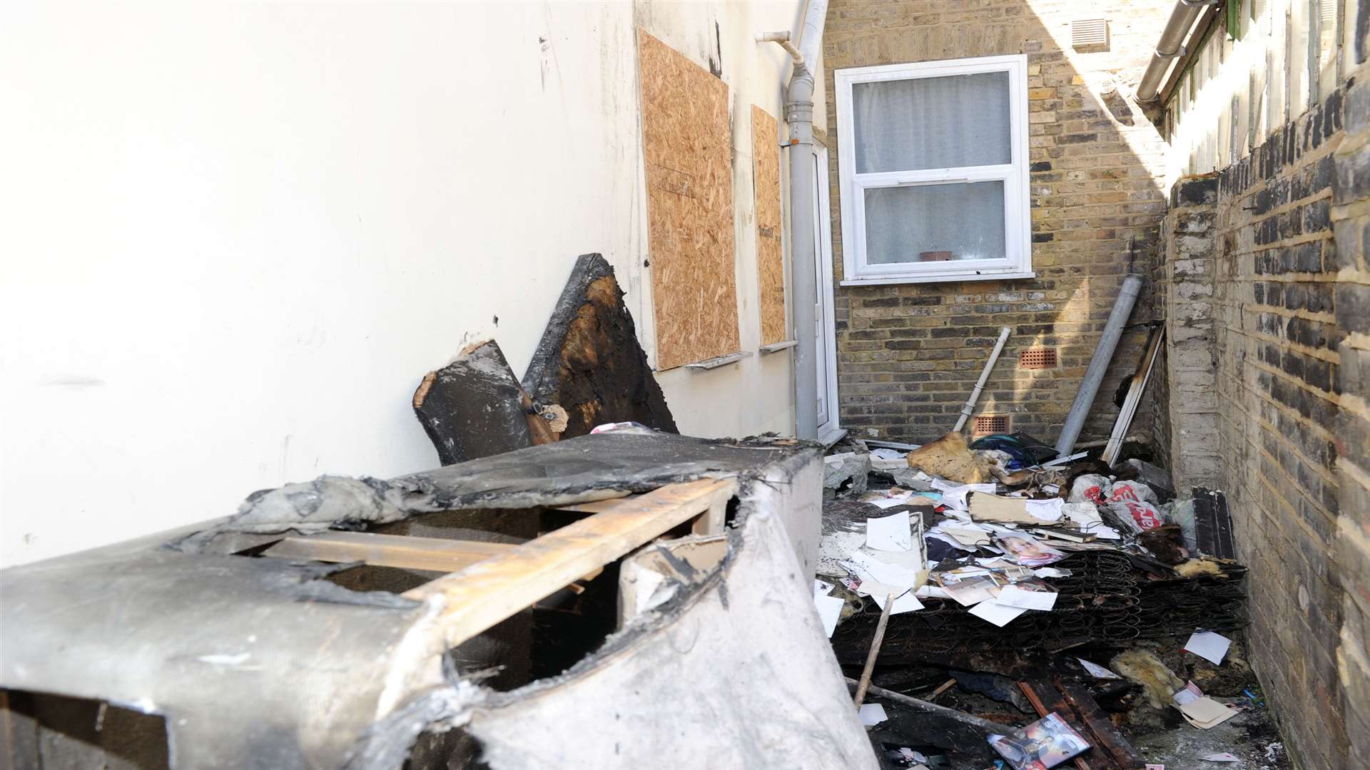 Burnt furniture outside the Strode Crescent flat