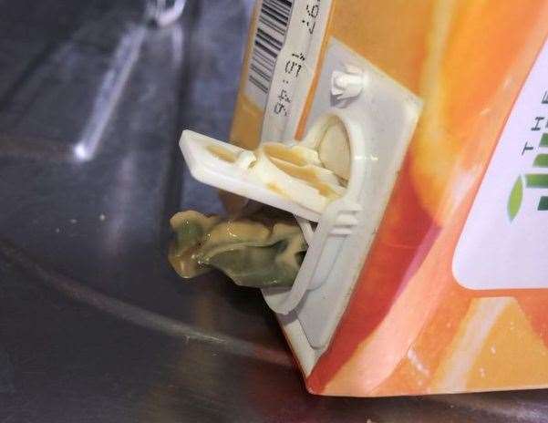 The mouldy carton of Juice Company orange juice from the Aldi store in Whitstable. Picture: Della-Marie Parnell