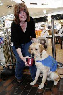 Janice McCauley and her guide dog Woody. The dog was refused water at Costas in Rainham.