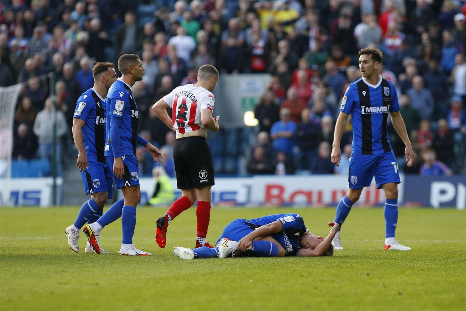 Jack Tucker down injured after Elliot Embleton's challenge Picture: Andy Jones