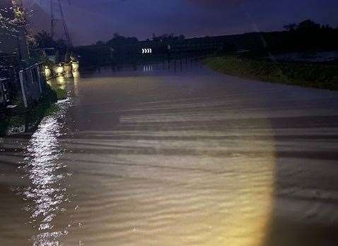 Flooding on Marie Bennett's land, which she believes is caused by the nearby Amazon depot