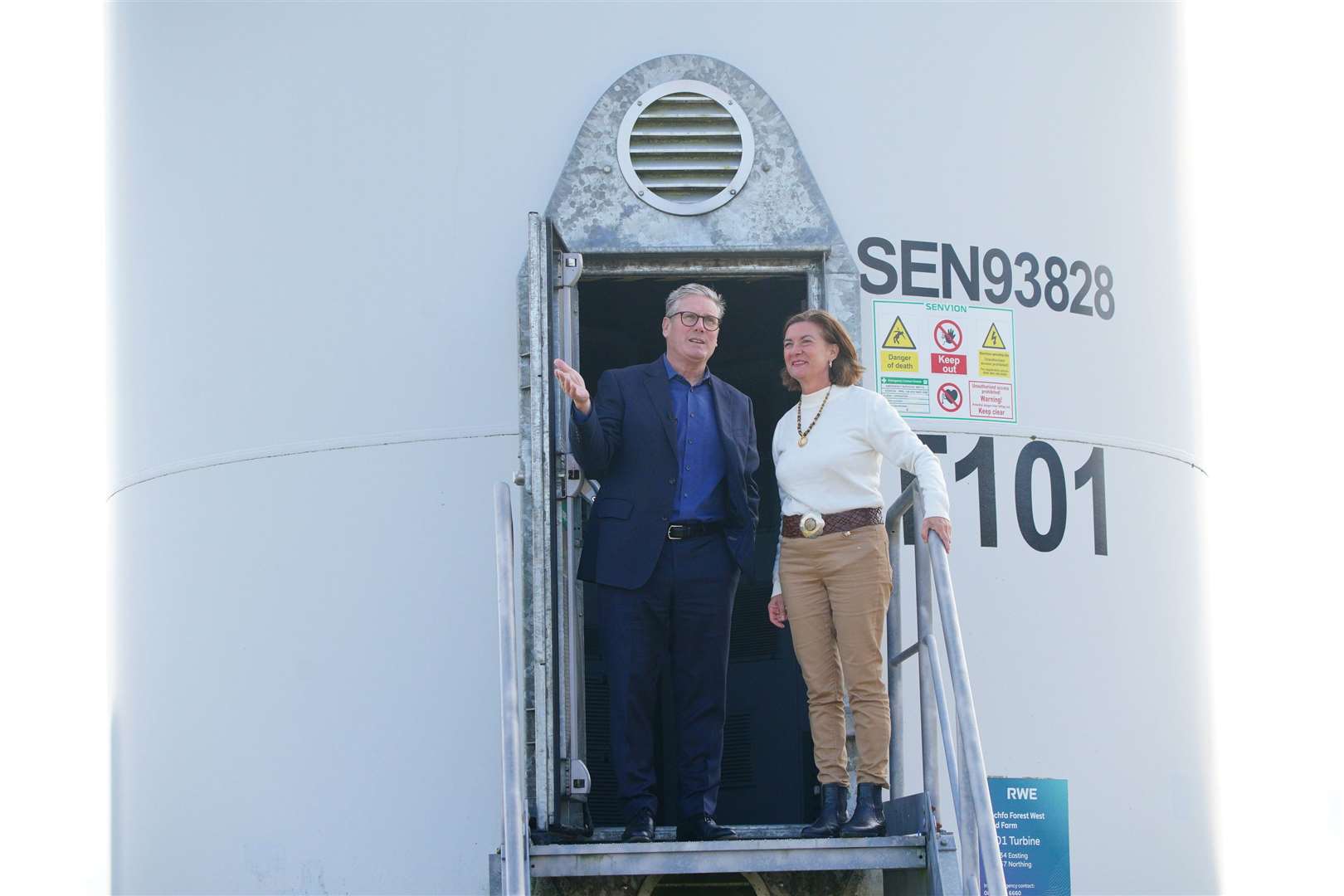 Prime Minister Sir Keir Starmer and First Minister Baroness Eluned Morgan saw inside a wind turbine (Ben Birchall/PA)