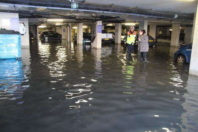 Cars left stranded in the flooded car park. Pic: @PaulWood1961