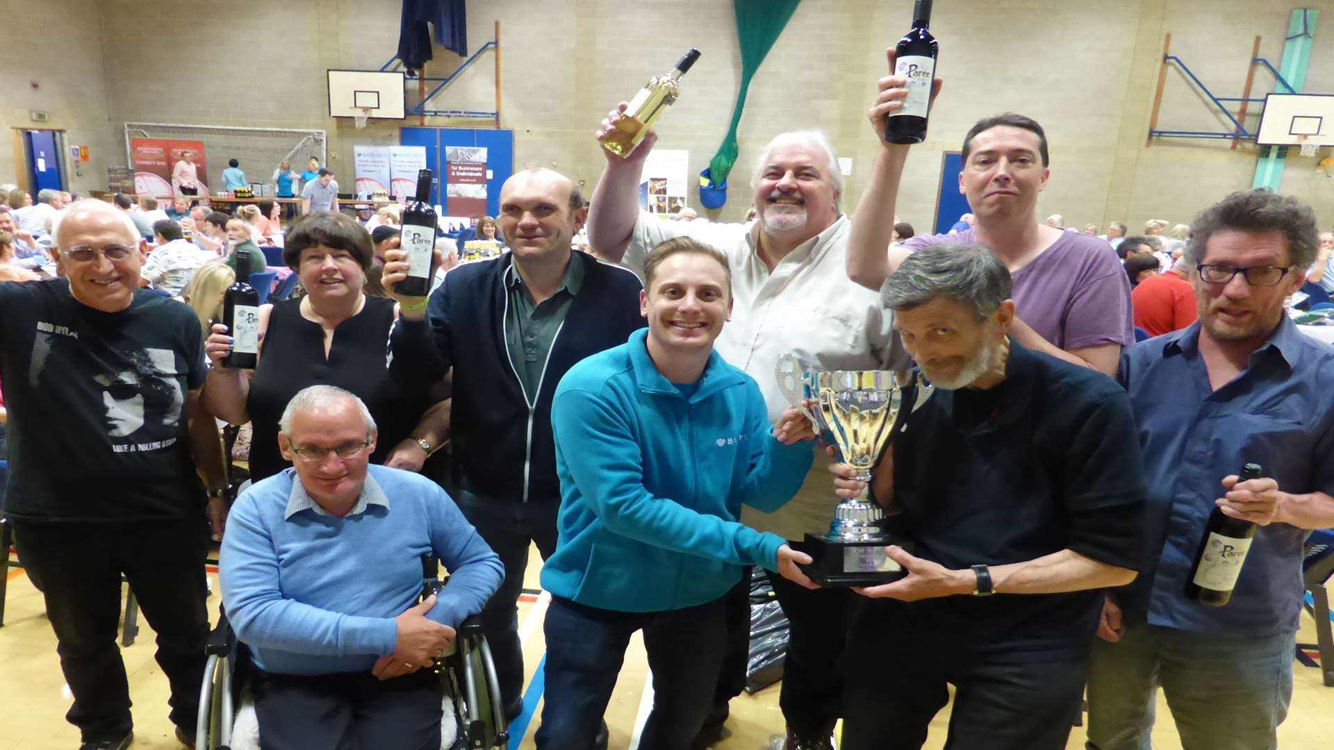 Jason Raggatt of Barclays Maidstone presents the champions trophy to Supernova. The Maidstone heat of the KM Big Charity Quiz attracted 29 teams and raised £8k for good causes.