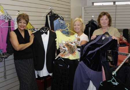 Yvonne Rodgers, Judy Rawlins and Caroline Saunders with some of the designer clothes which will be on sale