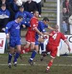 A jostle in the Brighton goalmouth during Saturday's clash