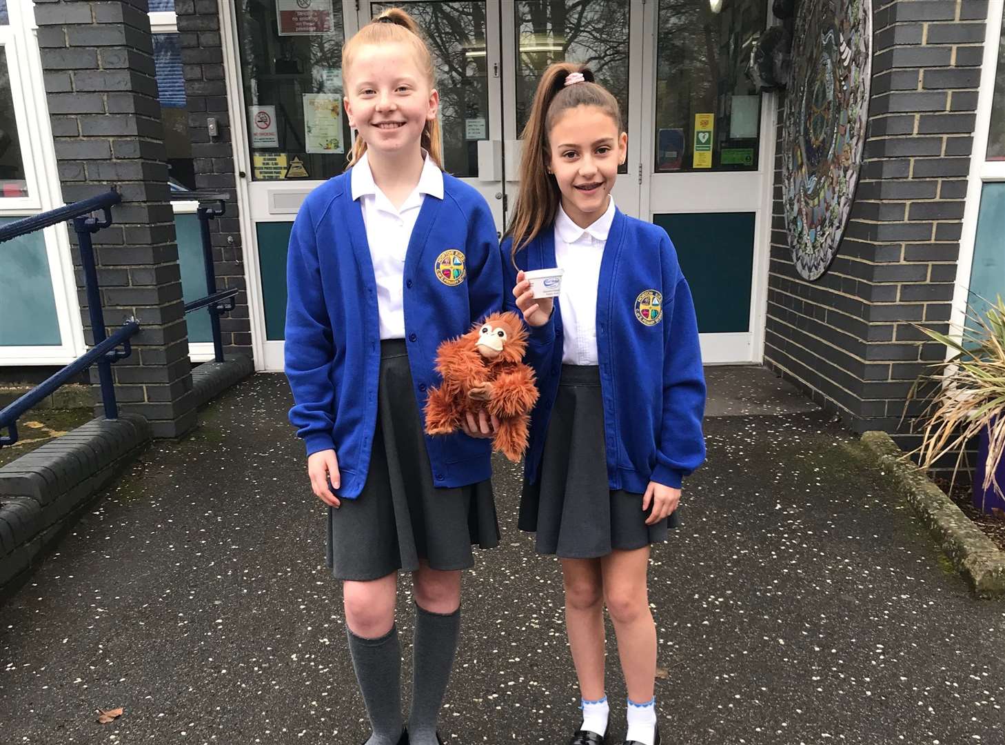 Kiki Enticknap, 10, with Mae Copley, also 10, outside their school in Horton Kirby (7538941)