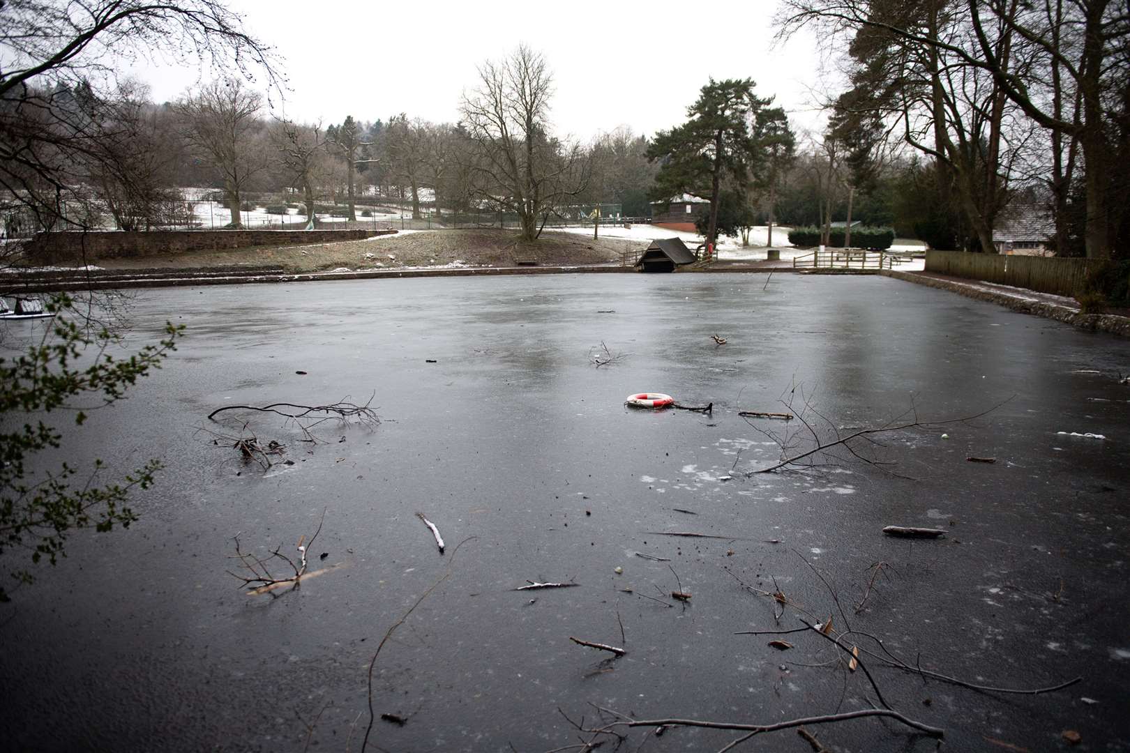 A frozen lake in the Lickey Hills area of Birmingham (Jacob King/PA)