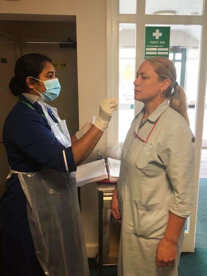 A member of staff being swabbed at a care home (Queen Mary University of London/PA)