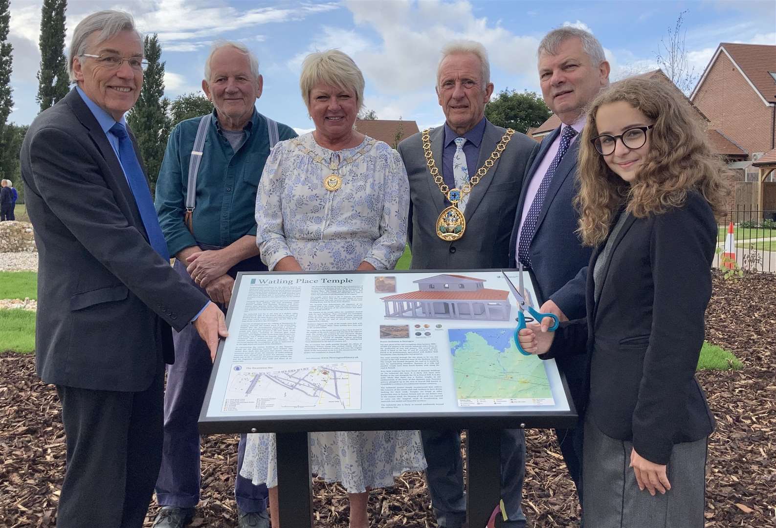 Pupil Ellie Wolfe, 12, cut the ribbon to unveil the recreation of the 2,000-year-old Romano-British temple discovered near her home at Newington, Sittingbourne