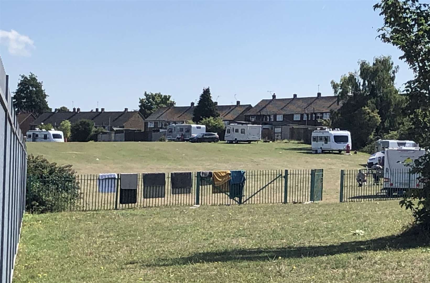 Washing can be seen draped over the children's park in St Gregory's Crescent, Gravesend