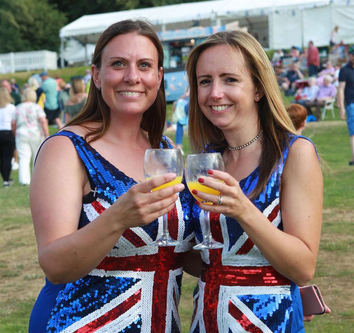 From left, Suzanne Lake and Kelly Lywood, from Sittingbourne in union jack dresses at Leeds Castle Classical Concert. Picture: John Westhrop
