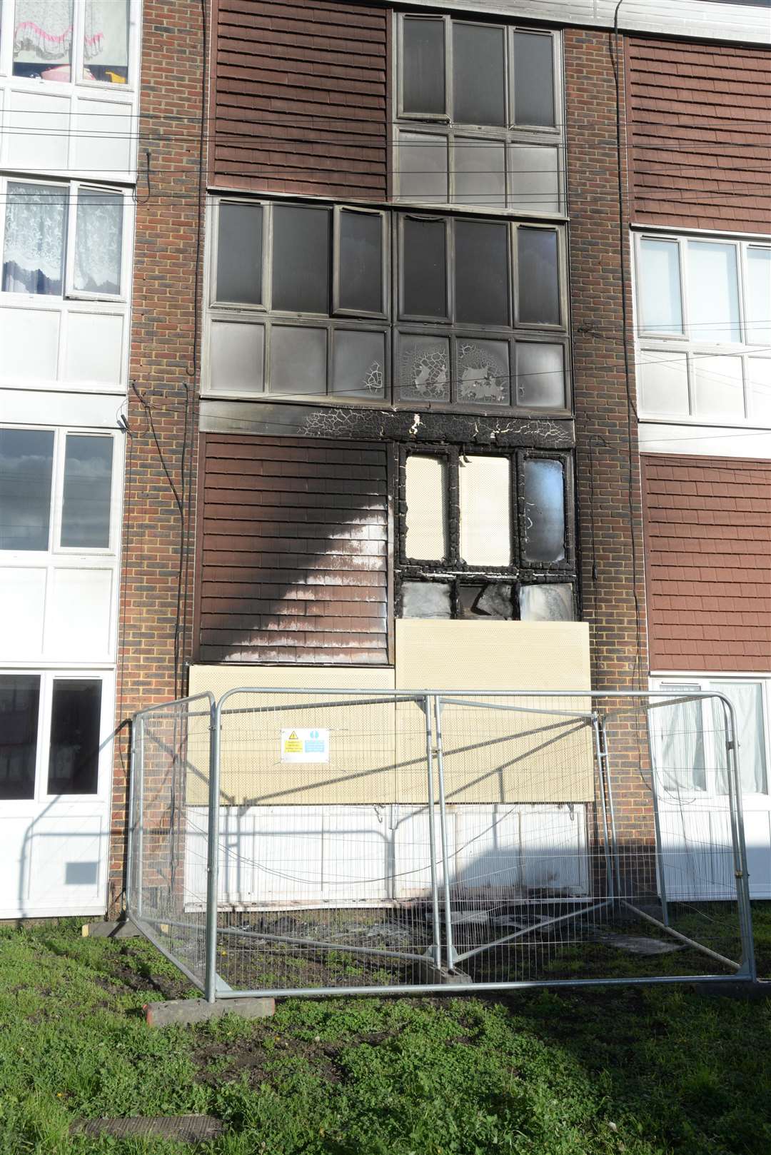 The area in front of a burnt out flat following a fatal fire before Christmas at Walshaw House, Quarry Square, Maidstone. Picture: Chris Davey. (6393329)