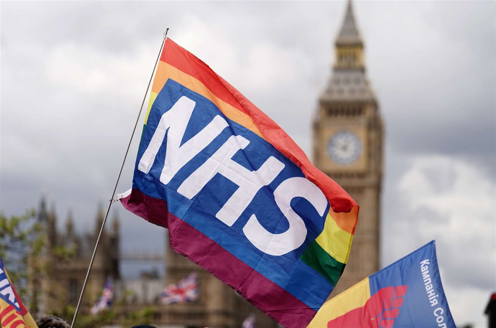 NHS workers on the picket line outside St Thomas’ Hospital, London, in May (Jordan Pettitt/PA)