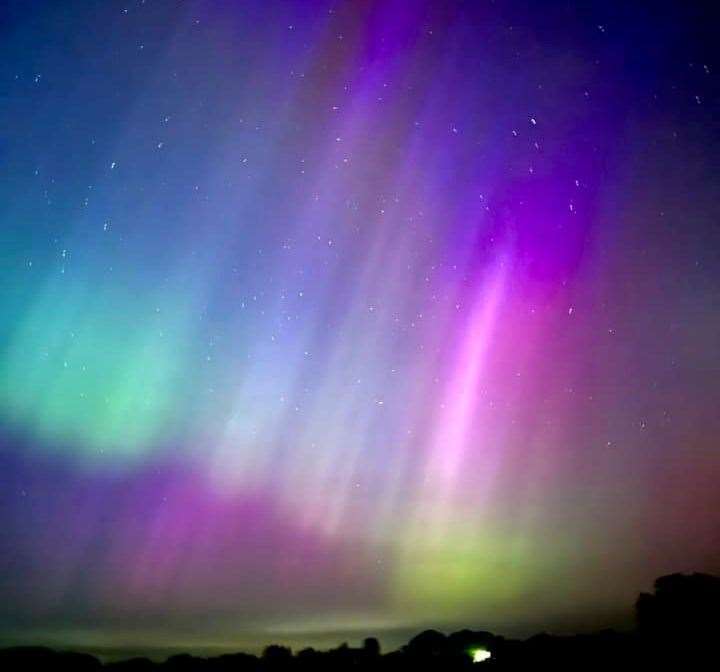 The brightly coloured Northern Lights over Aylesham on Friday. Picture: James Mercer