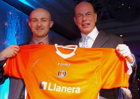 PARTNERSHIP: Meillio Teresa, MD of Llanera UK, left, with Richard Murray, chairman of Charlton PLC, show off new "home" shirt. Picture: MATT WALKER