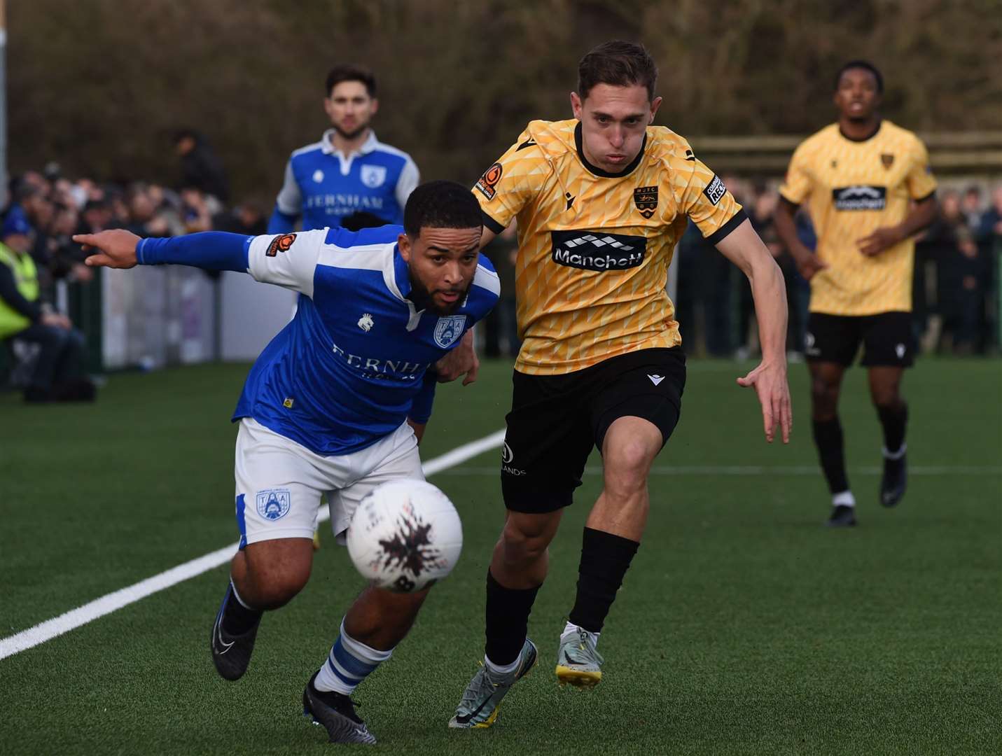 Jernade Meade tussles with Maidstone goalscorer Matt Rush. Picture: Steve Terrell