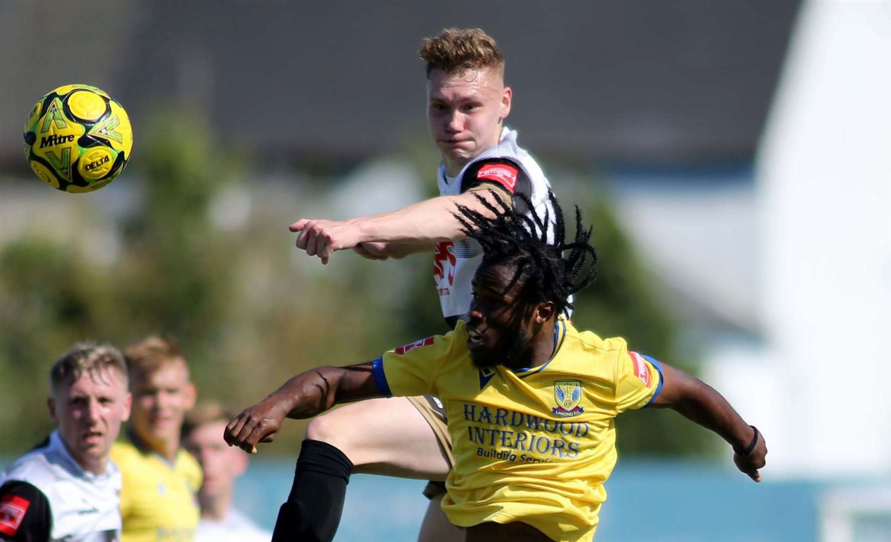 Defender Alex Green wins a header for Deal. Picture: Paul Willmott