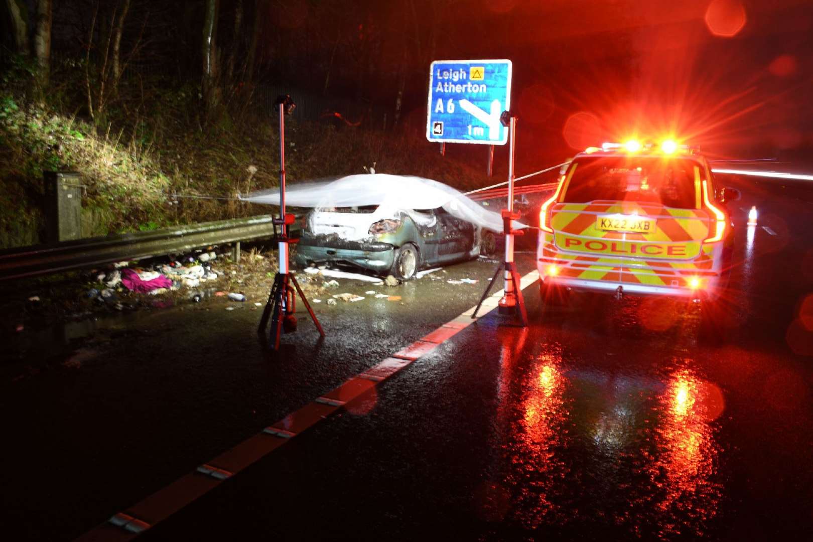 The defendants’ burnt out Peugeot 206 was found on the side of the M61 near Bolton, Greater Manchester (Metropolitan Police/PA)